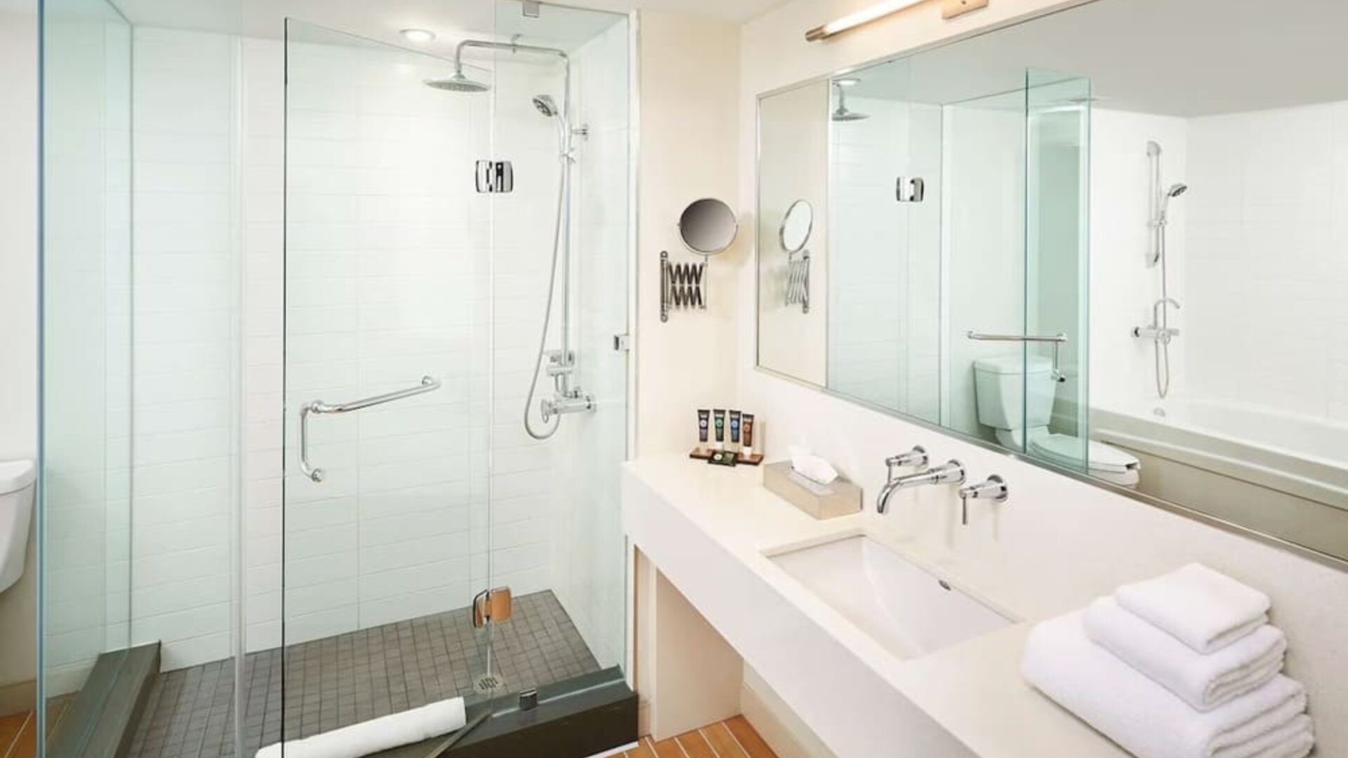 Guest bathroom with showerr at Novotel Toronto Vaughan Centre.