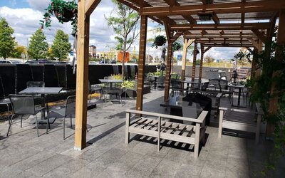 Outdoor lounge and dining space at Novotel Toronto Vaughan Centre.