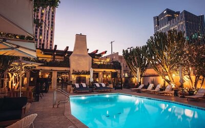 Outdoor pool at night at Hotel Figueroa.
