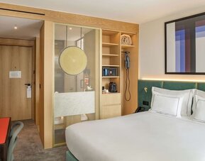 Comfortable king room with safe and coffee maker at Arts Hotel Porto.