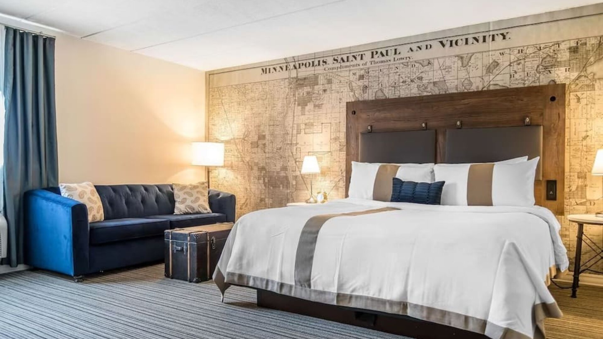 King bed with natural light at EnVision Hotel St. Paul South.