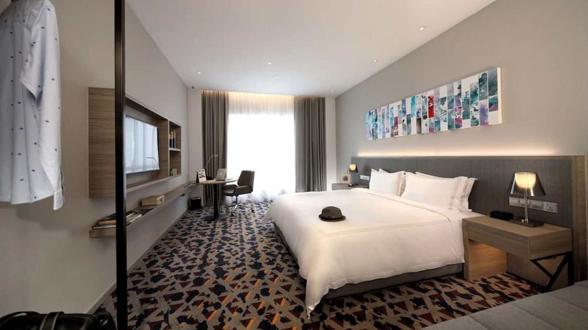 Delux king room with TV and natural light at Capri By Fraser Johor Bahru.