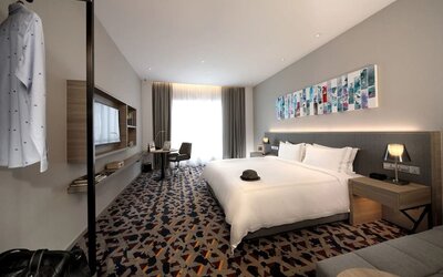Delux king room with TV and natural light at Capri By Fraser Johor Bahru.