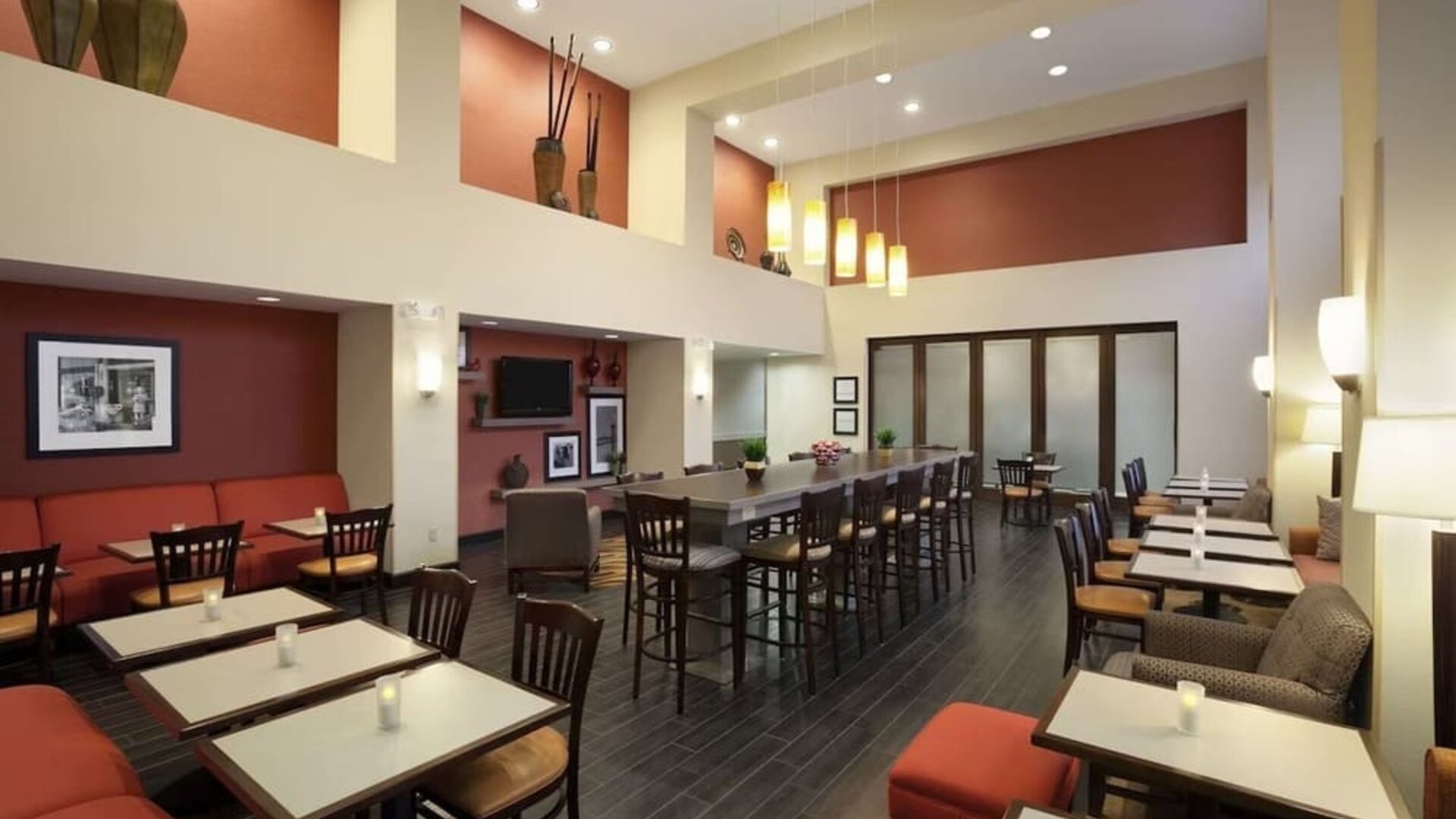 Coworking space and dining area at Hampton Inn & Suites Conroe - I-45 North.