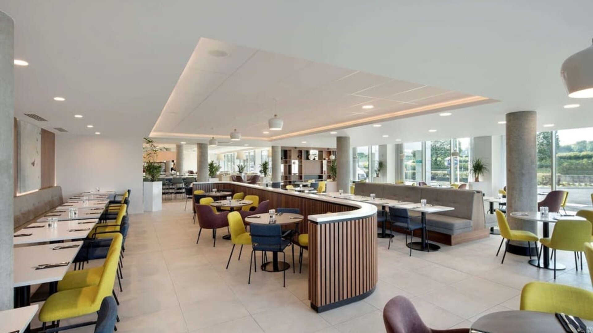 Lounge and coworking space at Hampton By Hilton London Stansted Airport.