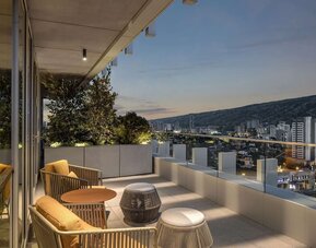 Outdoor terrace at Hilton Garden Inn Tbilisi Riverview.