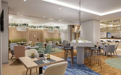 Lounge and lobby area at Hilton Garden Inn Tbilisi Riverview.