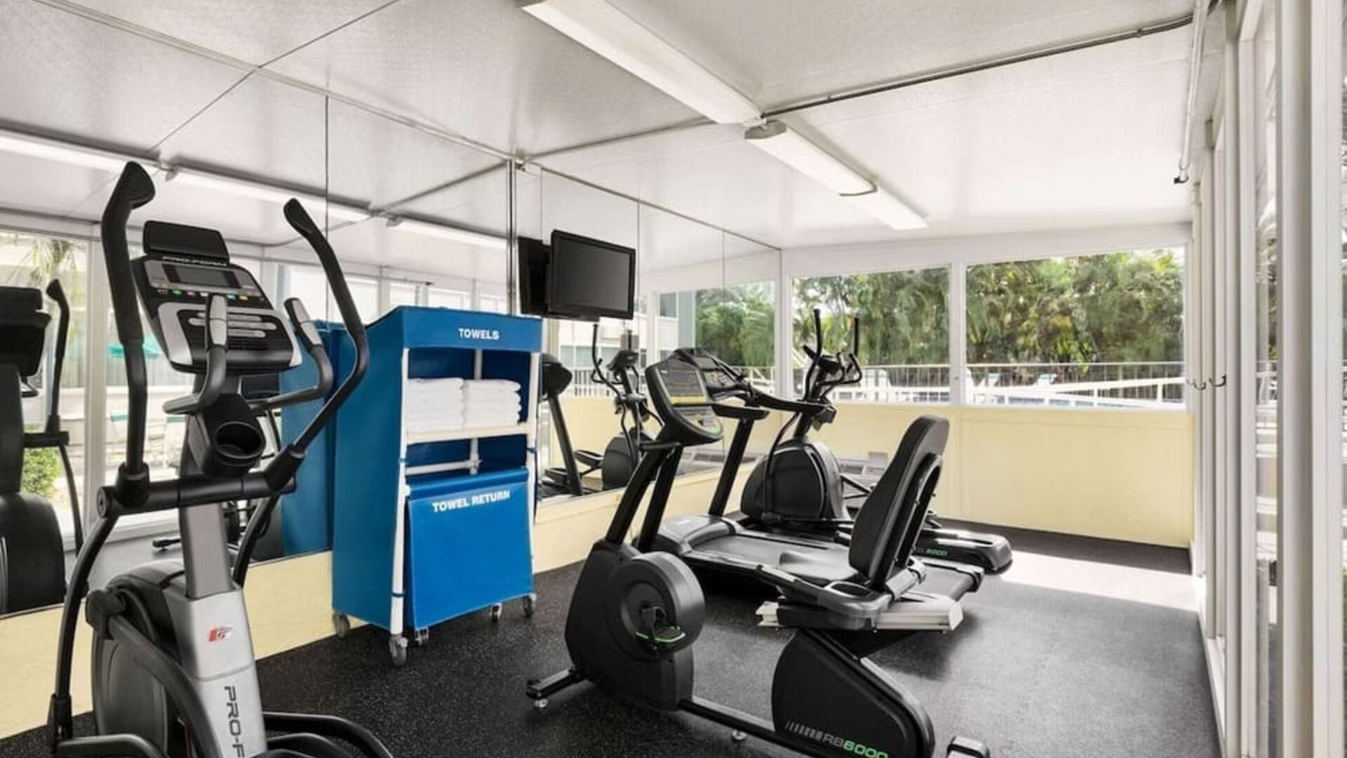 Fitness center at EnVision Hotel Miami International Airport.