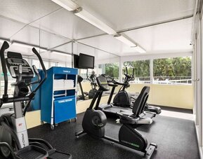 Fitness center at EnVision Hotel Miami International Airport.