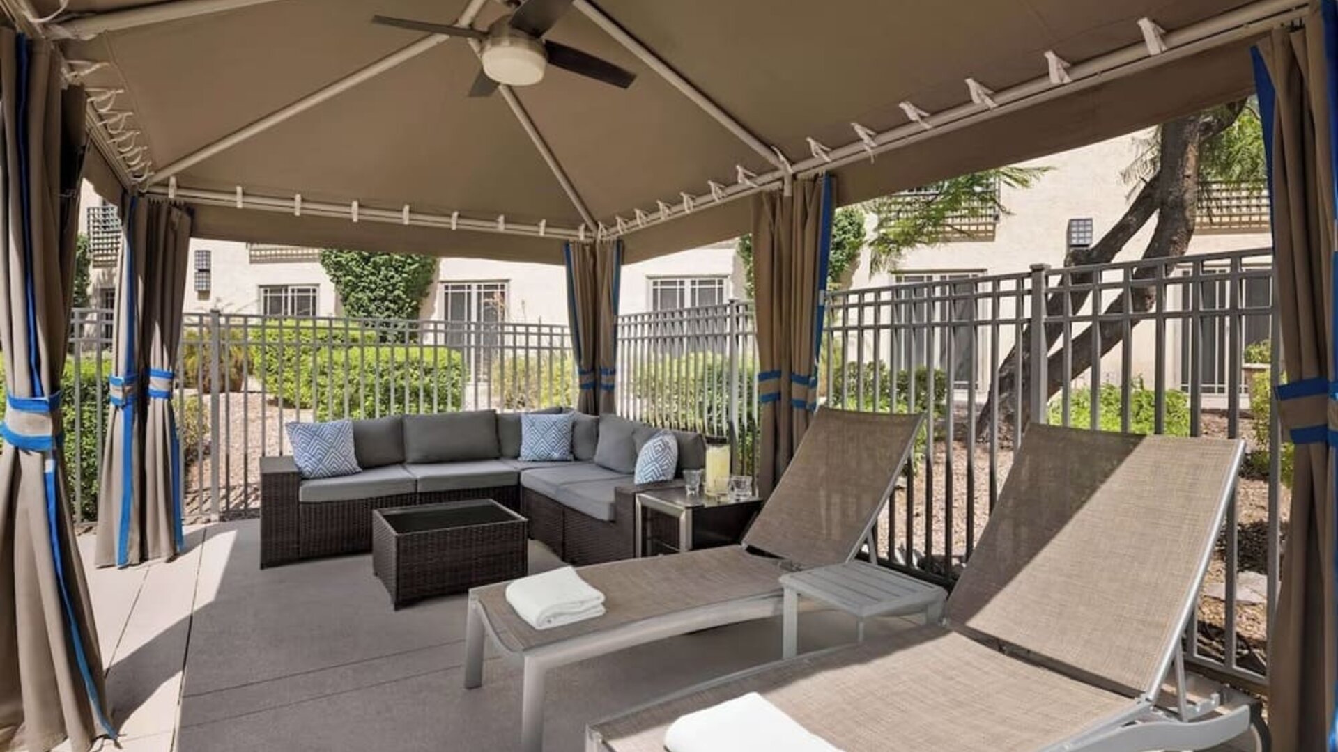 Cabanas and pool chairs at Hilton Scottsdale Resort & Villas.