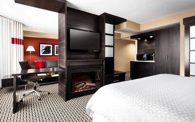 Spacious king room with work desk at Four Points By Sheraton Mississauga Meadowvale.