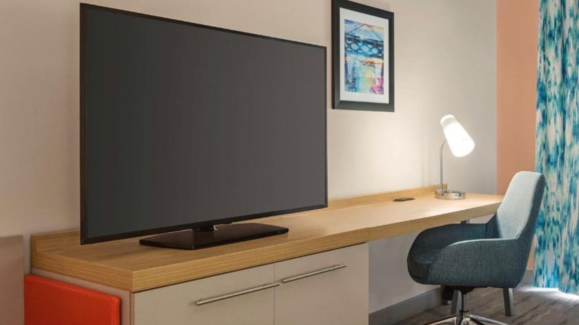 Delux king room with TV and work desk at Hilton Garden Inn Nashville West End Avenue.