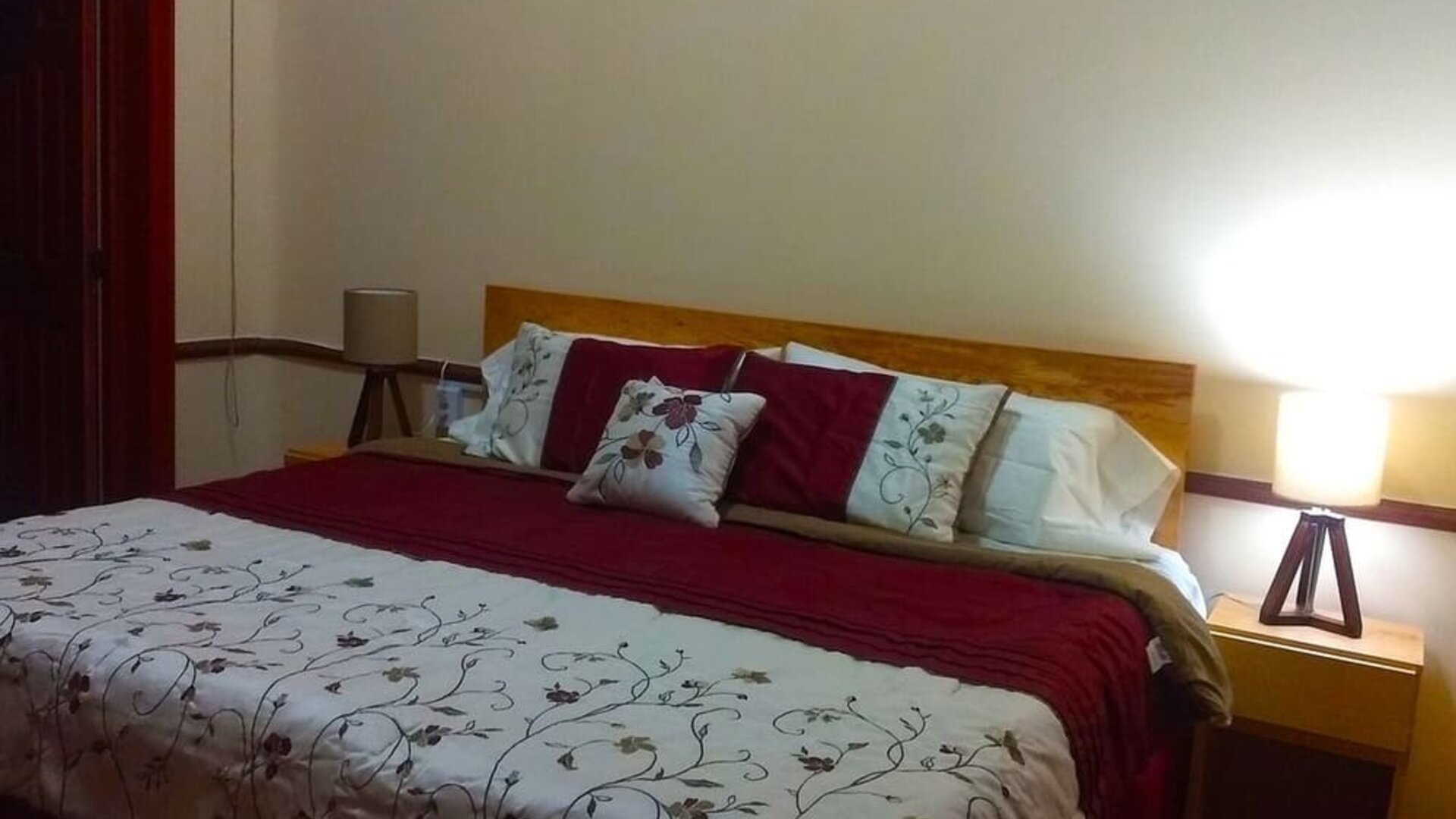 Comfortable king room at Casa María Hostal.