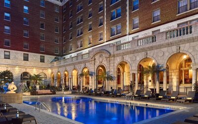Outdoor pool at night at The Chase Park Plaza Royal Sonesta St. Louis.