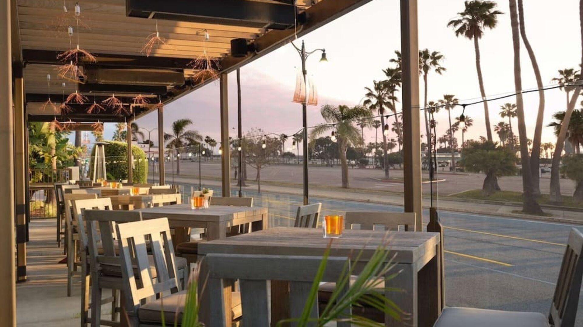 Outdoor eating area at Sonesta Redondo Beach & Marina.
