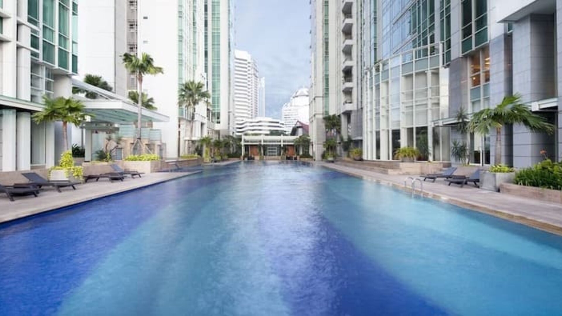 Luxurious outdoor pool at Fraser Residence Sudirman Jakarta.
