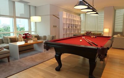 Pool table and game room at Fraser Residence Sudirman Jakarta.