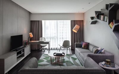 Spacious king room with lounge at Fraser Place Setiabudi Jakarta.