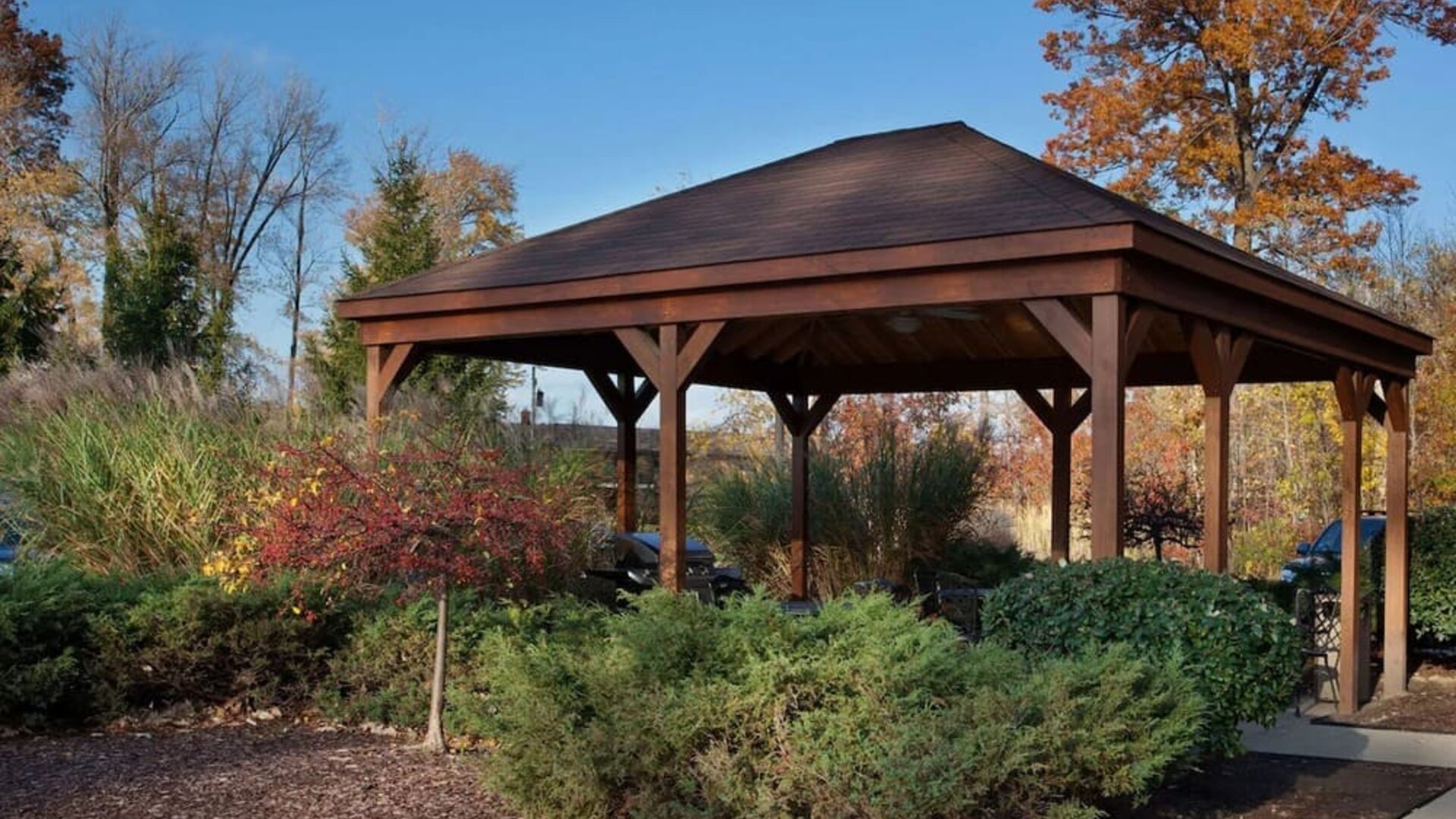 Outdoor terrace and garden at Sonesta Simply Suites Cleveland North Olmsted Airport.