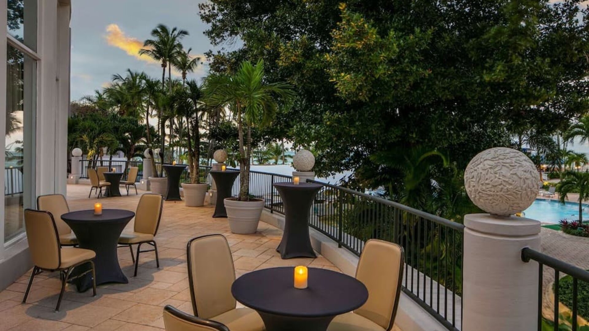 Outdoor dining and terrace at Royal Sonesta San Juan.