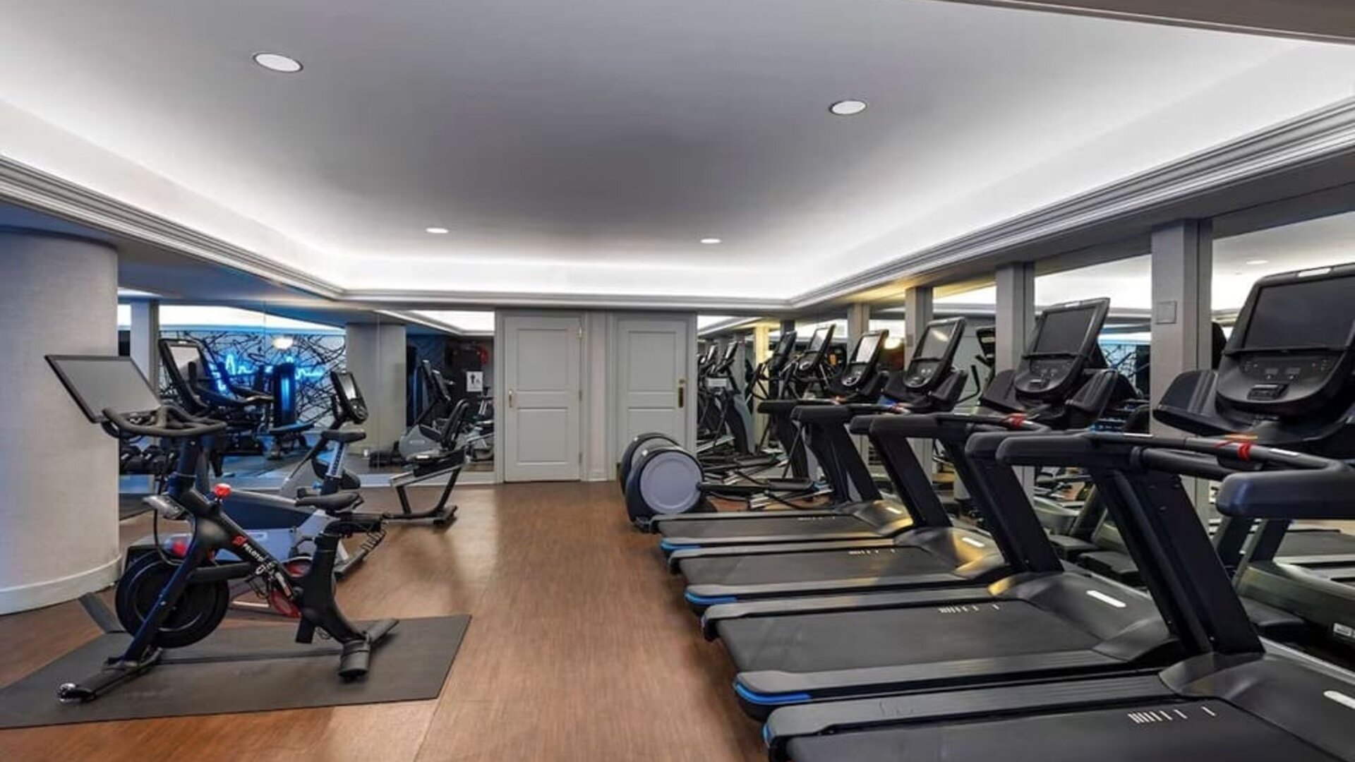 The hotel’s fitness center has both a range of exercise machines and racks of free weights.