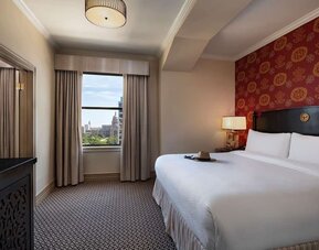 Romantic king room at The Stephen F Austin Royal Sonesta Hotel.