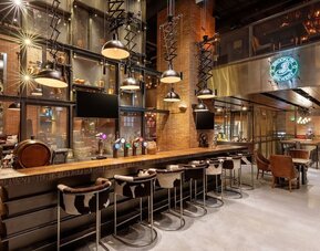 Cozy hotel bar at Hilton Dubai Al Habtoor City.