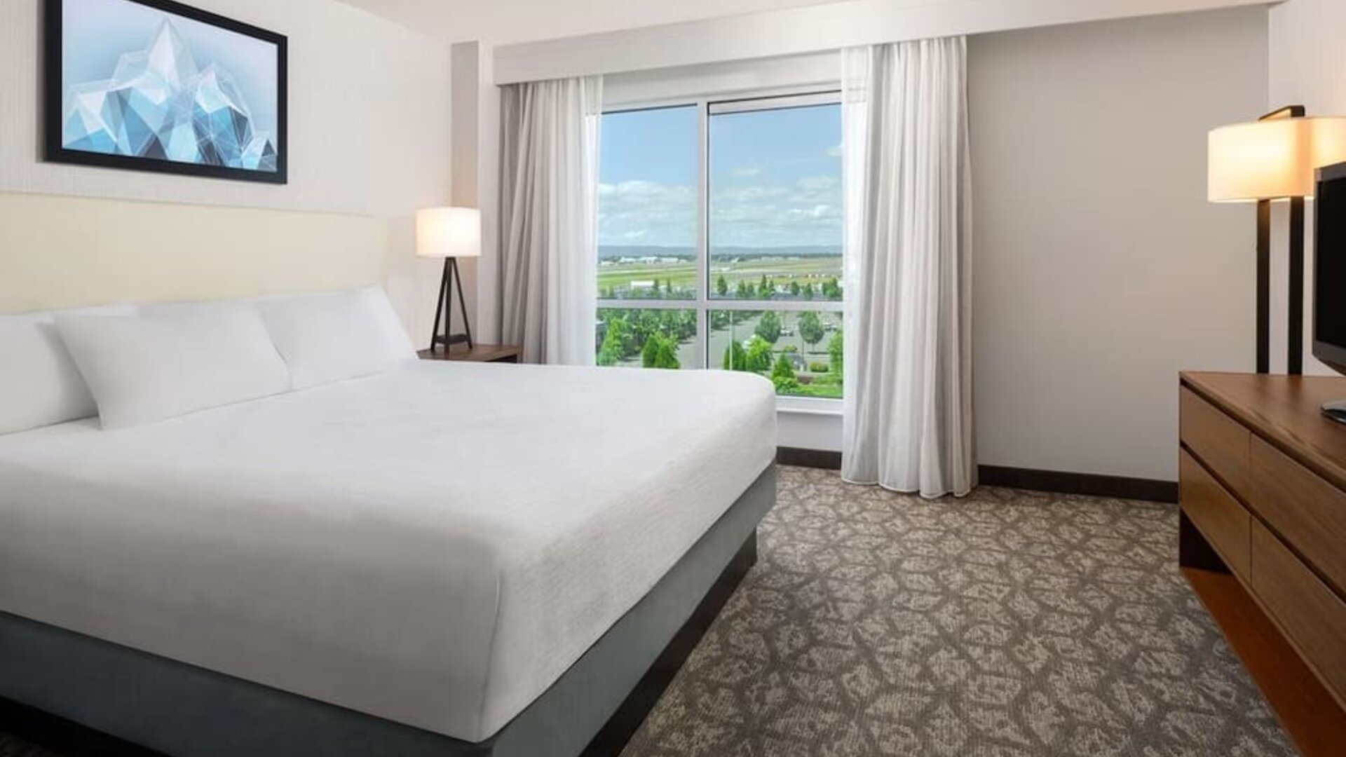 Day use room with natural light at Embassy Suites By Hilton Portland Airport.