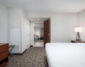 King room with TV at Embassy Suites By Hilton Portland Airport.
