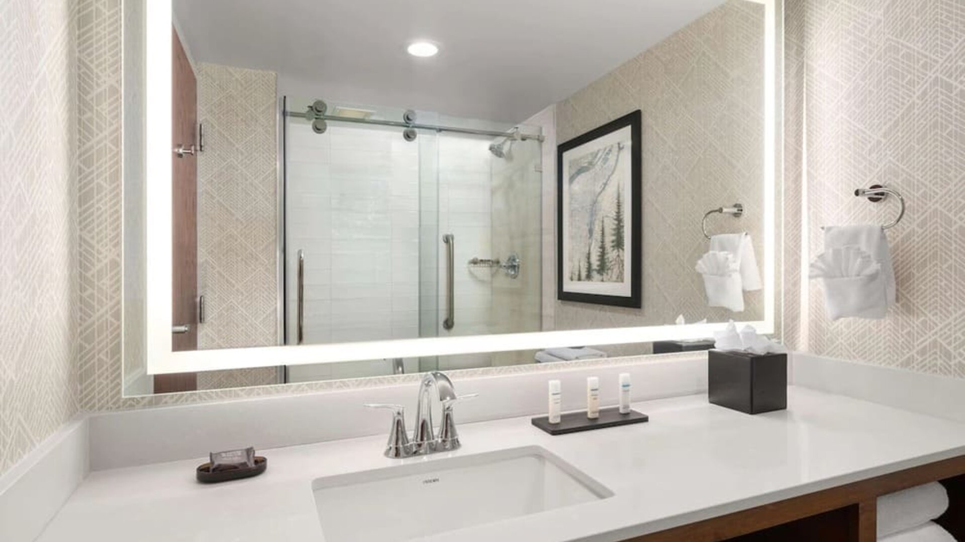 Private bathroom at Embassy Suites By Hilton Portland Airport.