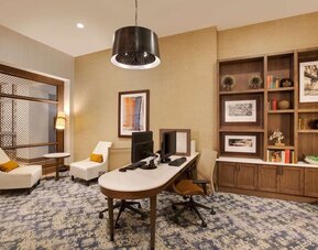 Business center at Homewood Suites By Hilton Louisville Downtown.