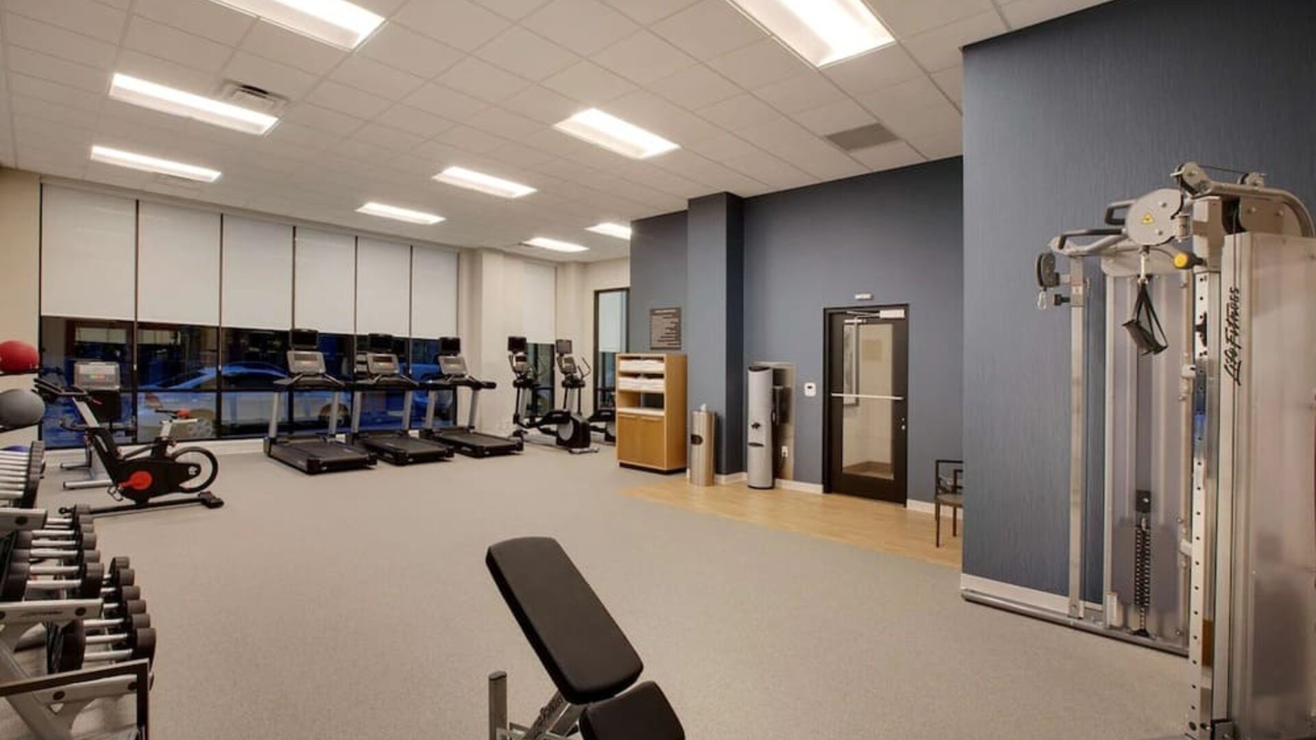 Fitness center at Homewood Suites By Hilton Louisville Downtown.