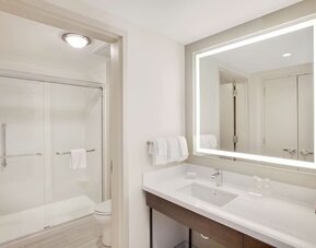 Private bathroom at Homewood Suites By Hilton Louisville Downtown.
