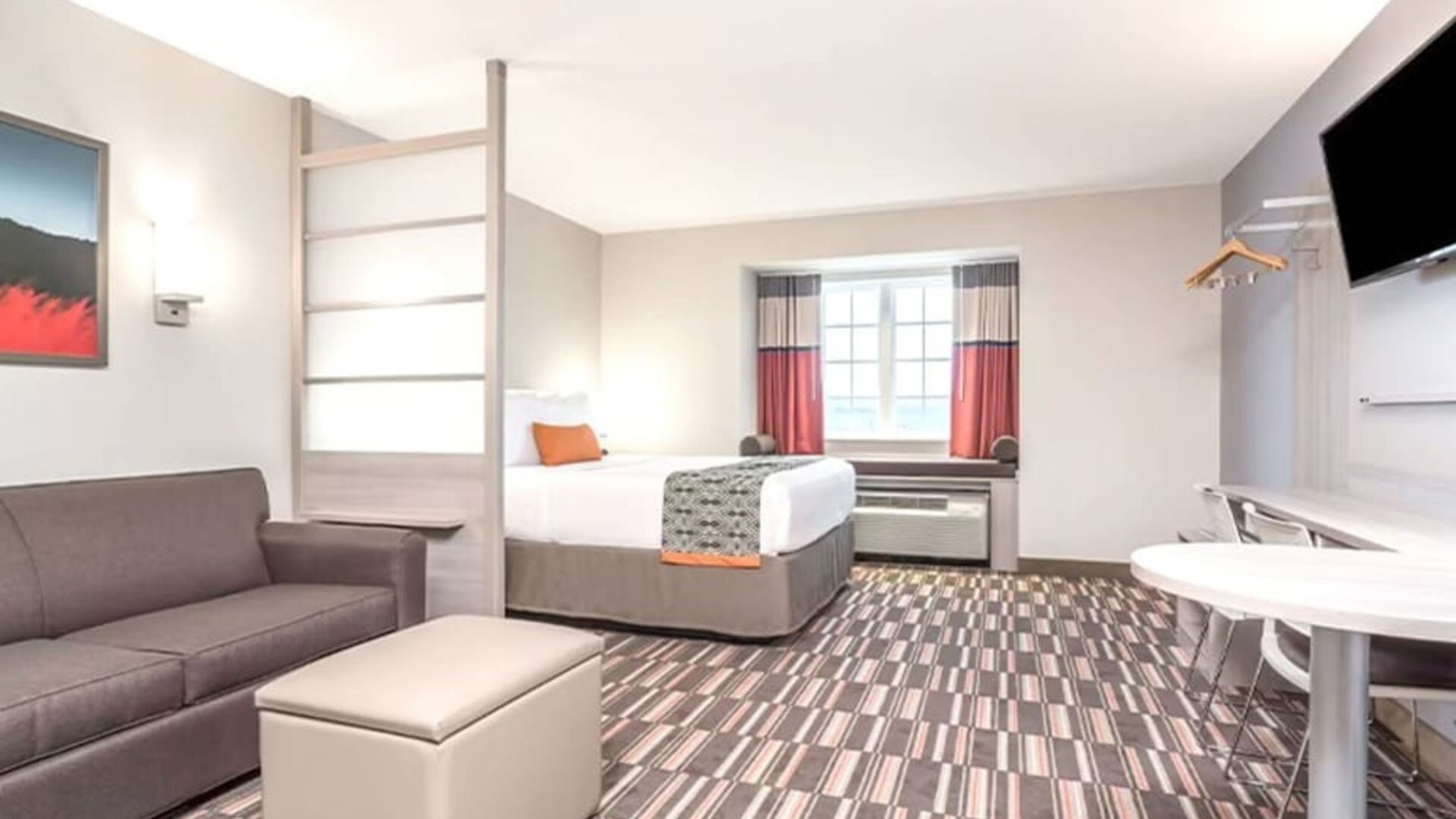 Spacious king suite at Coratel Inn & Suites By Jasper Rochester.