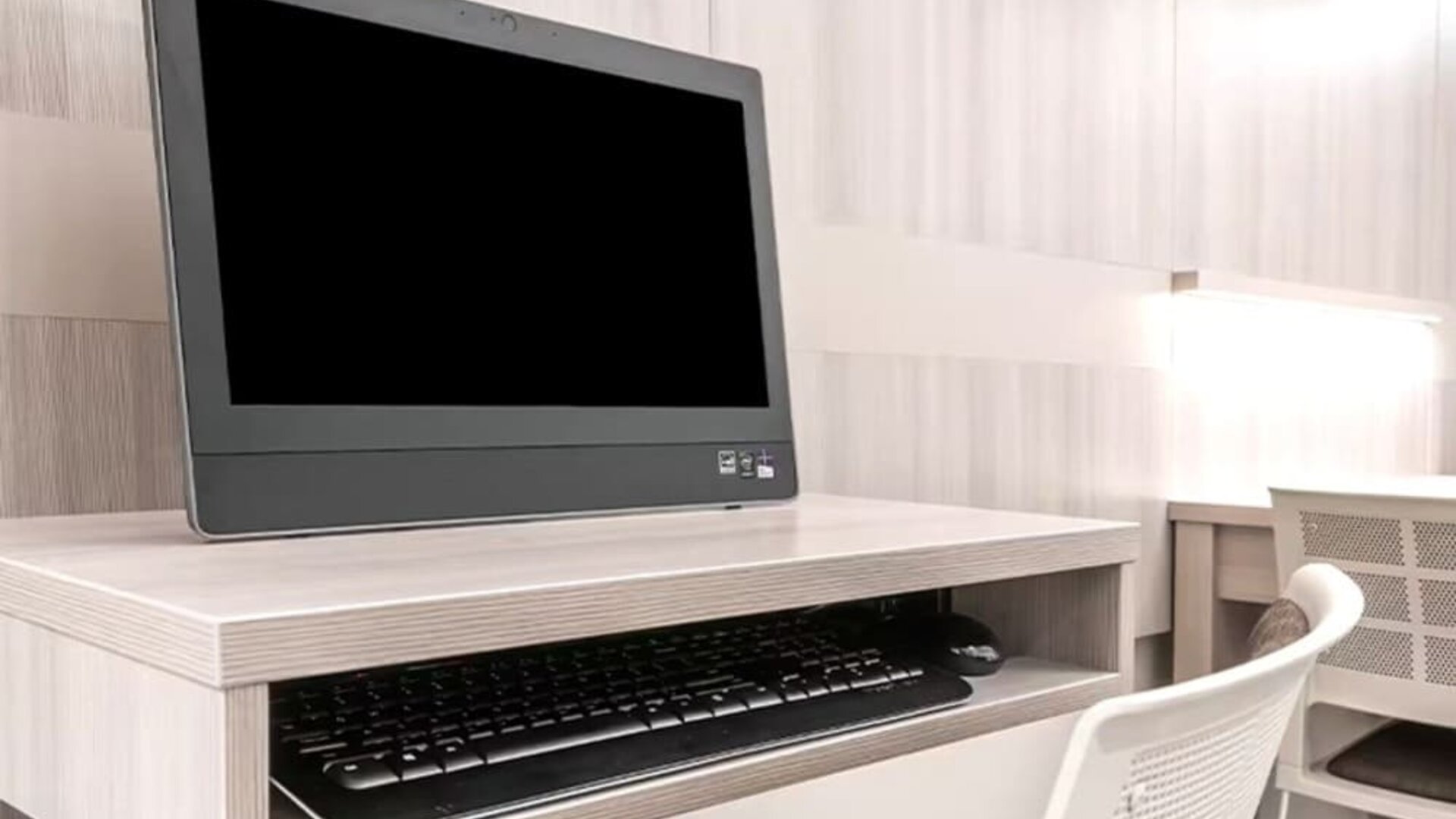 Business center at Coratel Inn & Suites By Jasper Rochester.