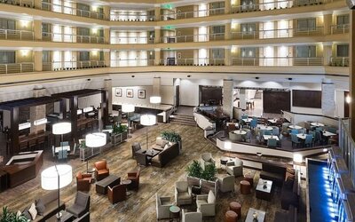 Lobby and coworking space at Embassy Suites By Hilton Denver Tech Center.