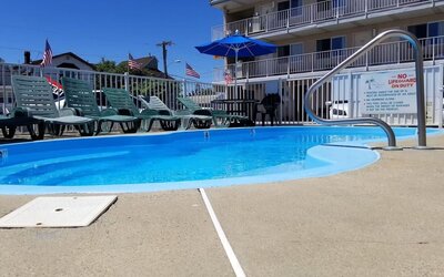 Relaxing outdoor pool at Bay Breeze Motel.