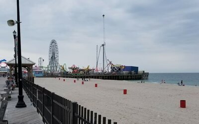 Beach arcade and promenade nearby at Bay Breeze Motel.