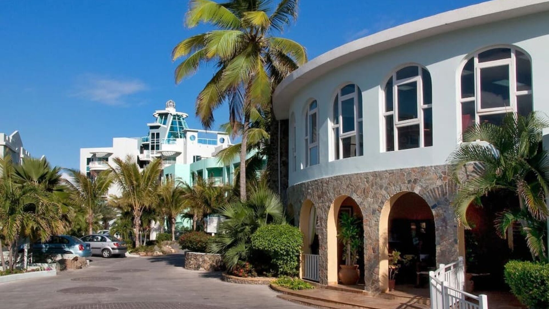 Hotel exterior and entrance at Oyster Bay Beach Resort.