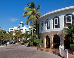 Hotel exterior and entrance at Oyster Bay Beach Resort.