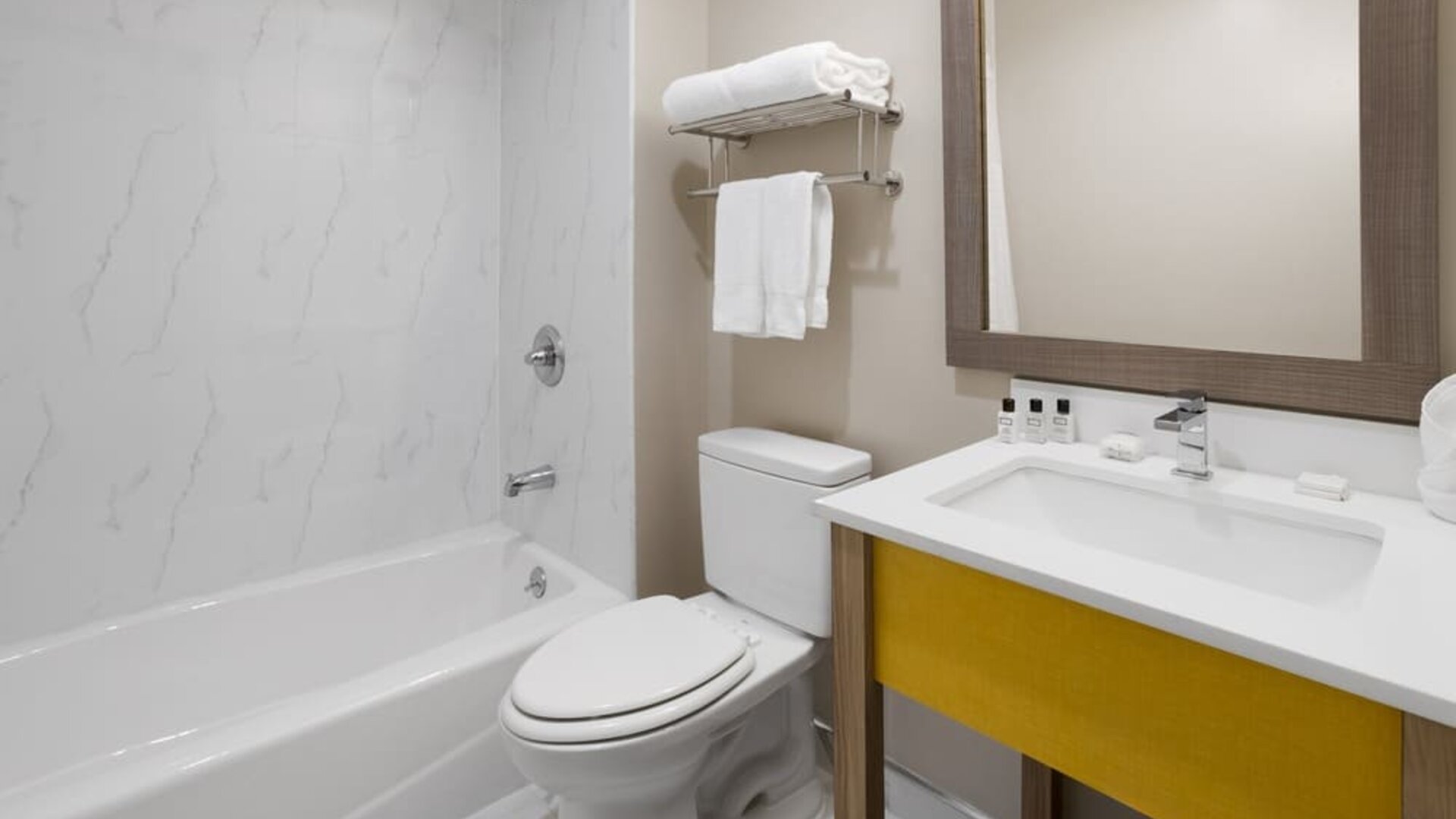 Guest bathroom at Days Inn By Wyndham Staten Island.