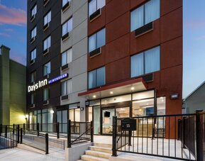 Hotel entrance at Days Inn By Wyndham Staten Island.