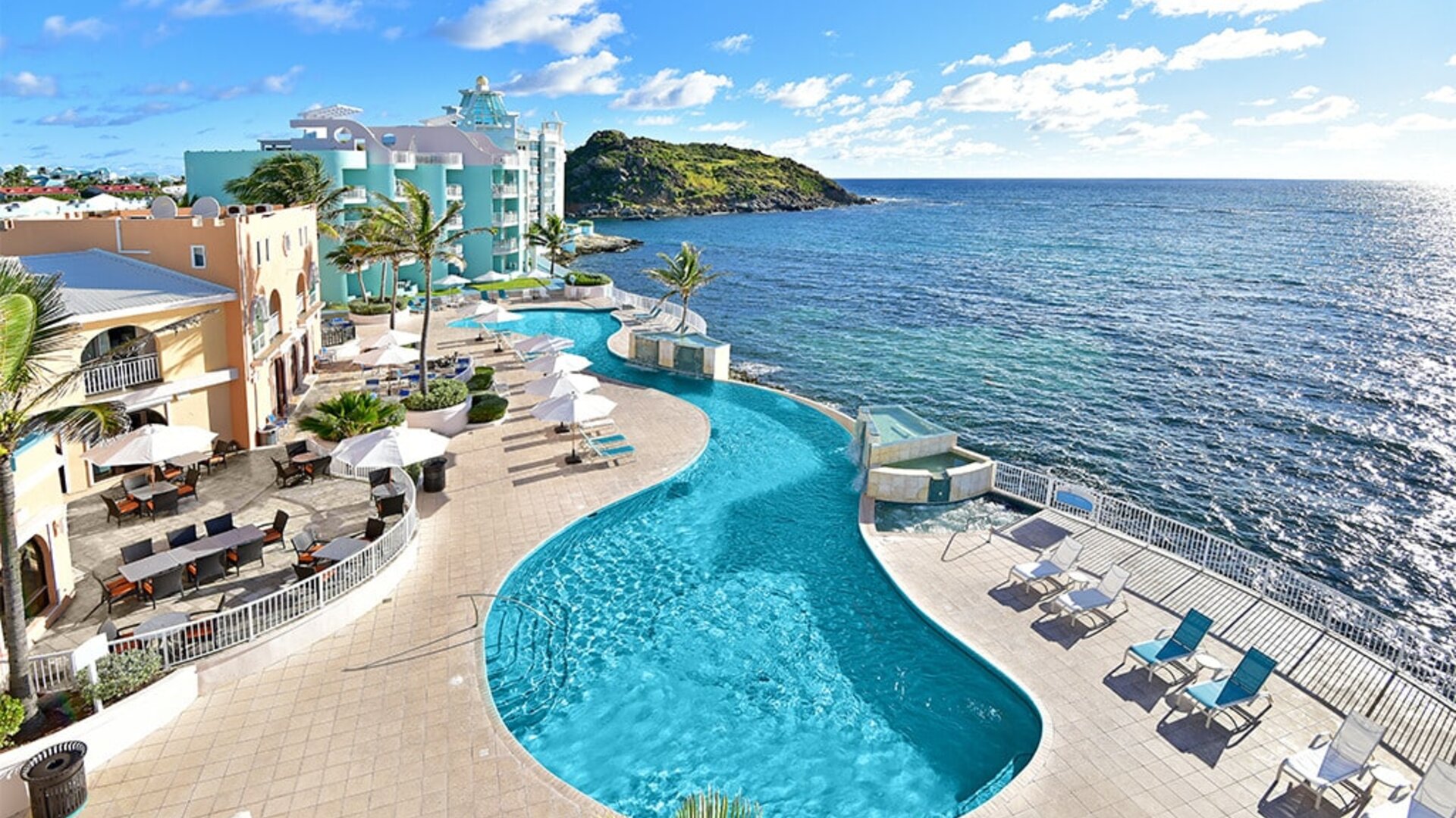 Daytime angle of glistening Infinity Pool at Oyster Bay Resort in St. Maarten.