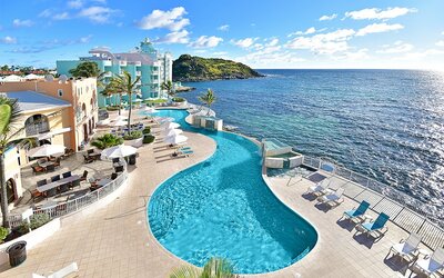 Daytime angle of glistening Infinity Pool at Oyster Bay Resort in St. Maarten.