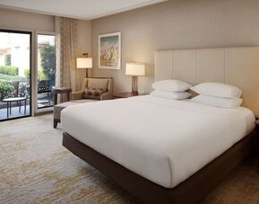 Romantic king room with natural light at DoubleTree By Hilton Ontario Airport.