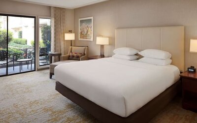Romantic king room with natural light at DoubleTree By Hilton Ontario Airport.