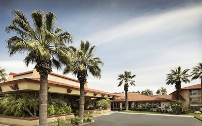 Hotel exterior and parking at DoubleTree By Hilton Ontario Airport.