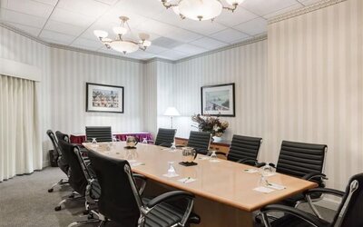 Professional meeting room at Uptown Oasis San Jose Airport.