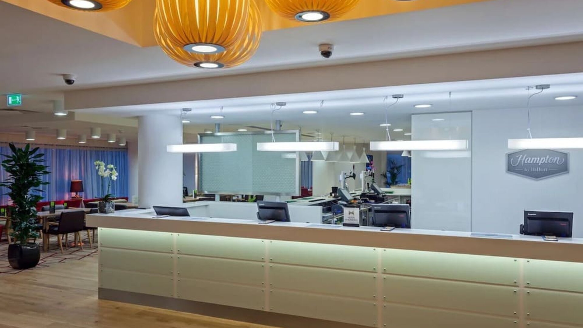 Lobby and hotel entrance at Hampton By Hilton London Gatwick Airport.