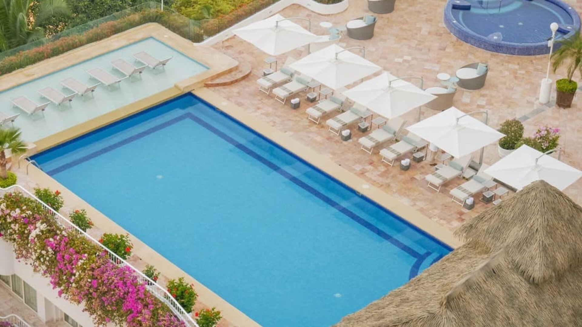 Large outdoor pool at Grand Miramar All Luxury Suites & Residences.